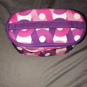 Pink, Purple and White cosmetic bag.